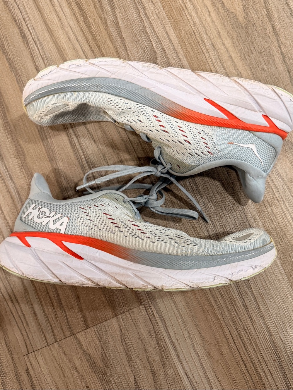 Hoka Neutral Running Sneakers in Light Gray with Orange Accent